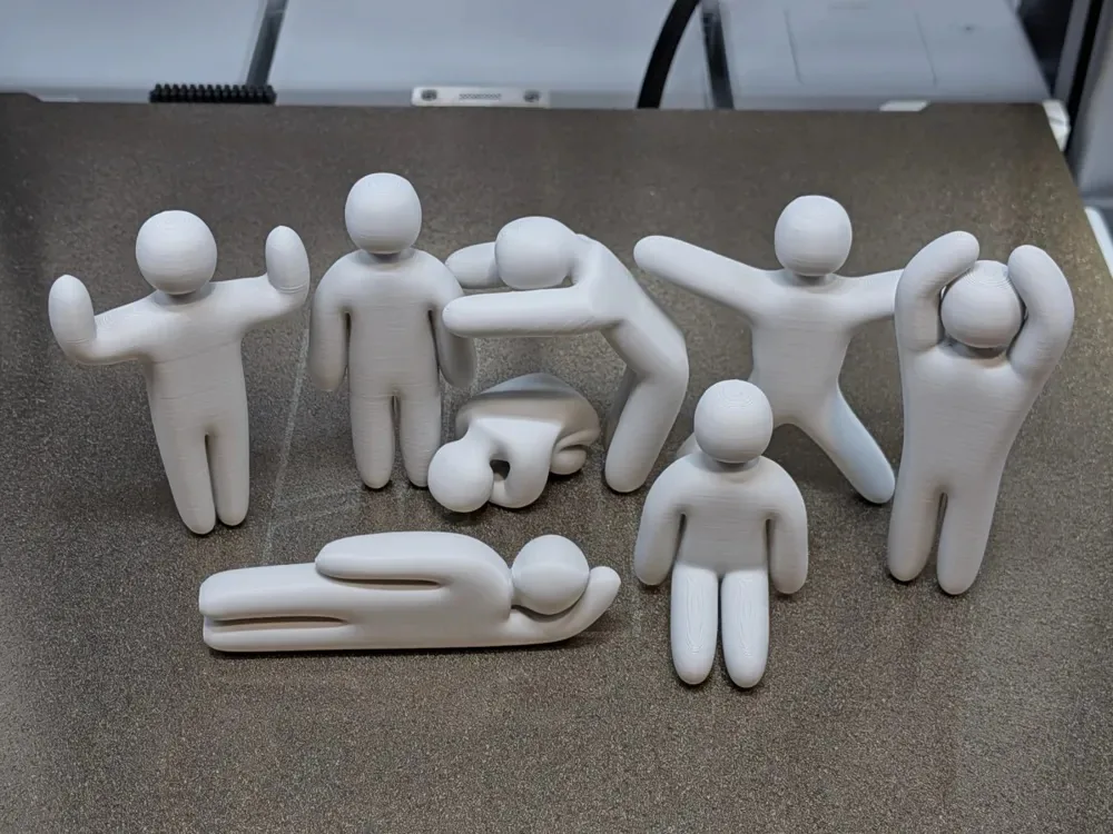 Set de siete figuras humanas blancas en distintas poses